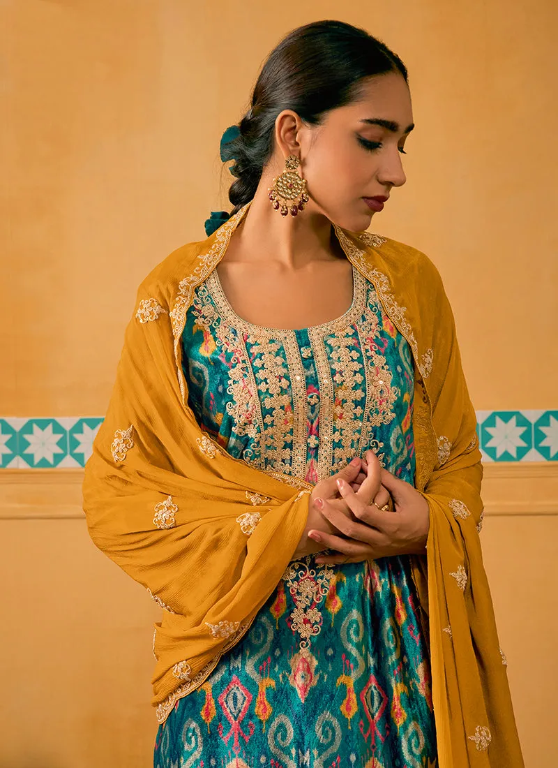 Turquoise And Yellow Embroidered Velvet Kurta Pant Suit